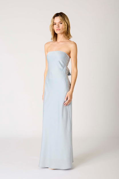  light blue strapless gown with a bow detail