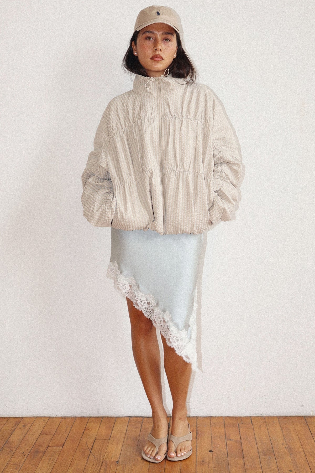 high neck beige textured zip-up jacket 