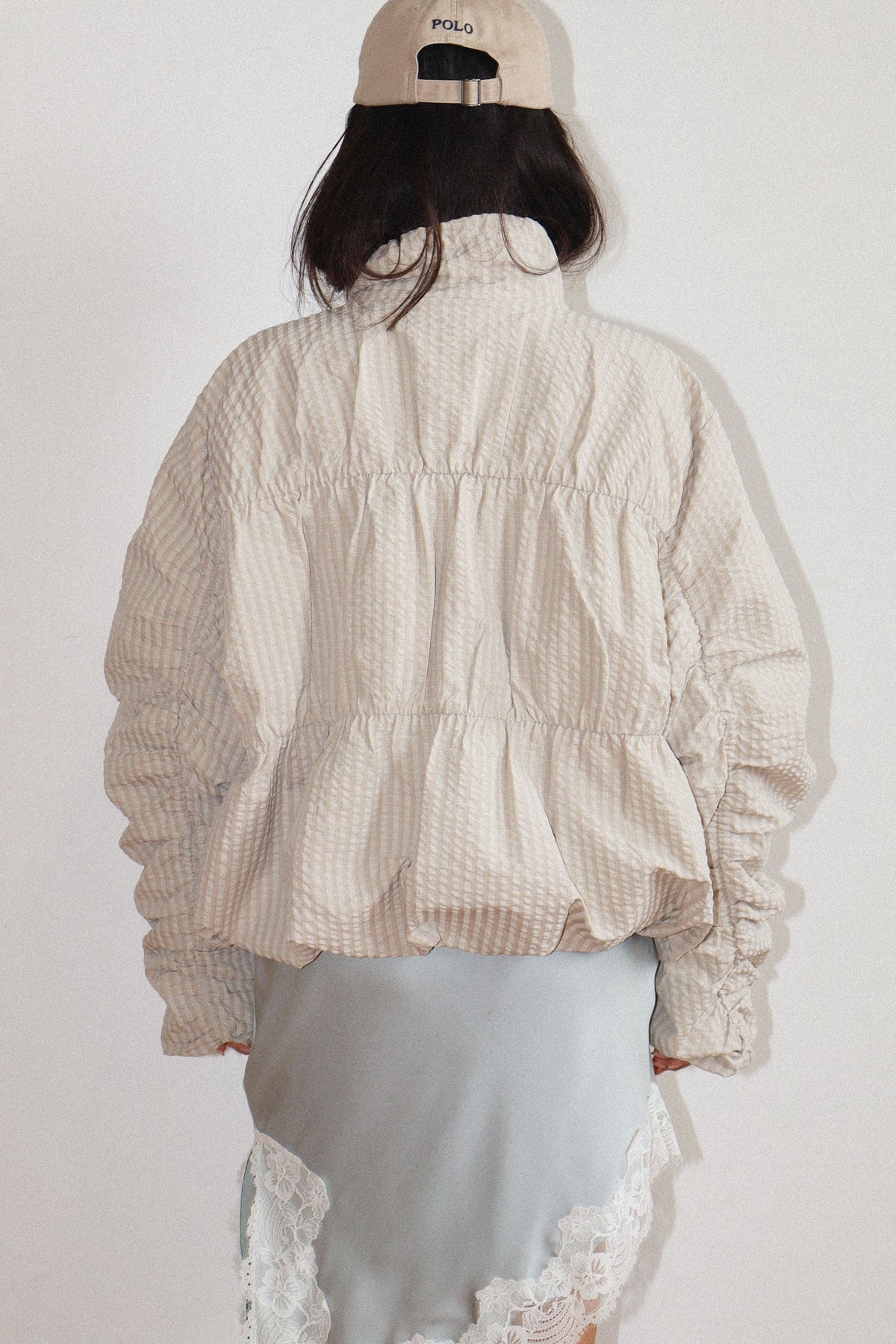 high neck beige textured zip-up jacket 
