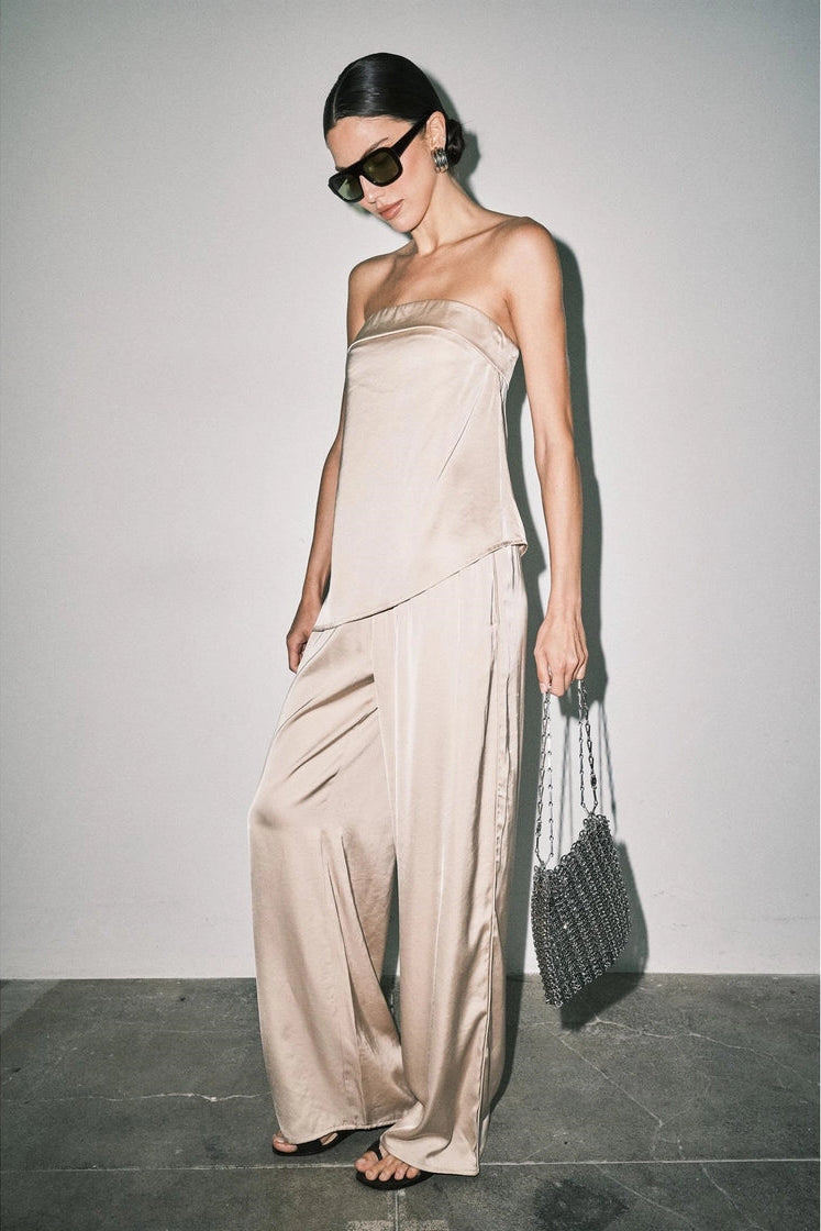 chic satin strapless top and matching wide-leg pants in a champagne beige color